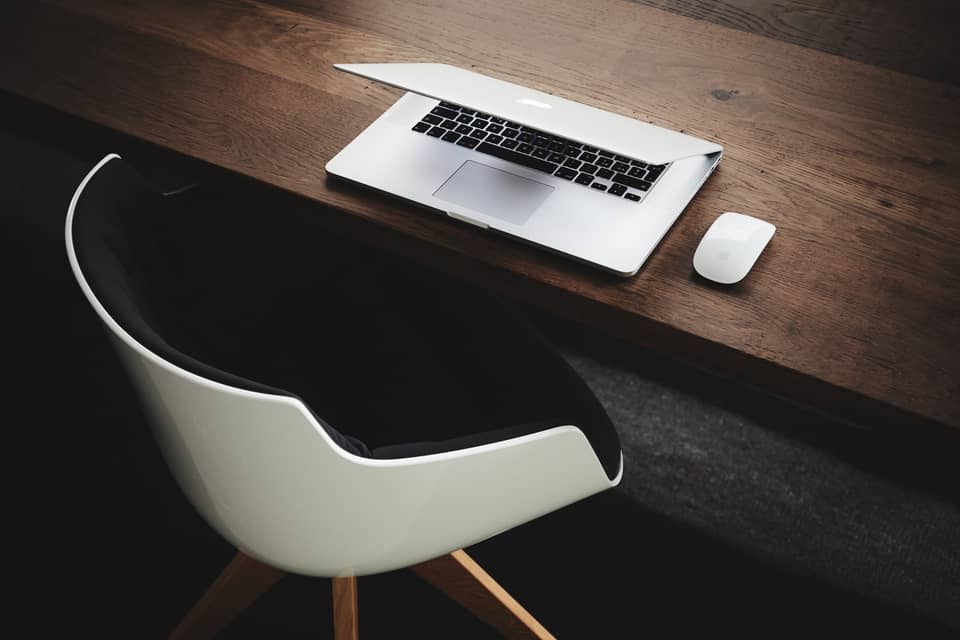 A desk after work in Brescia, Italy, photographed by Luca Bravo in 2017.