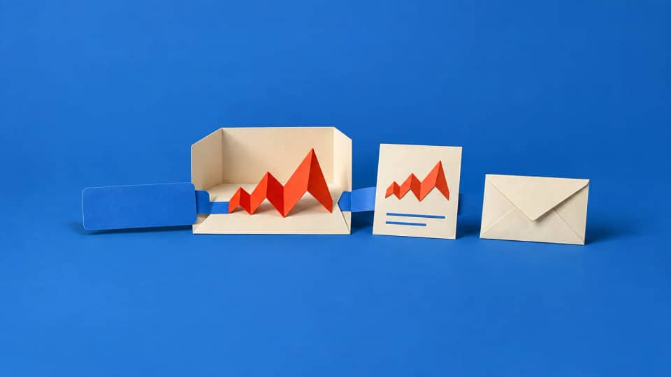 A blue input tab raises a red zigzag in a paper test stage, and the matching fold accompanies its report card; a separate candidate envelope remains unopened.
